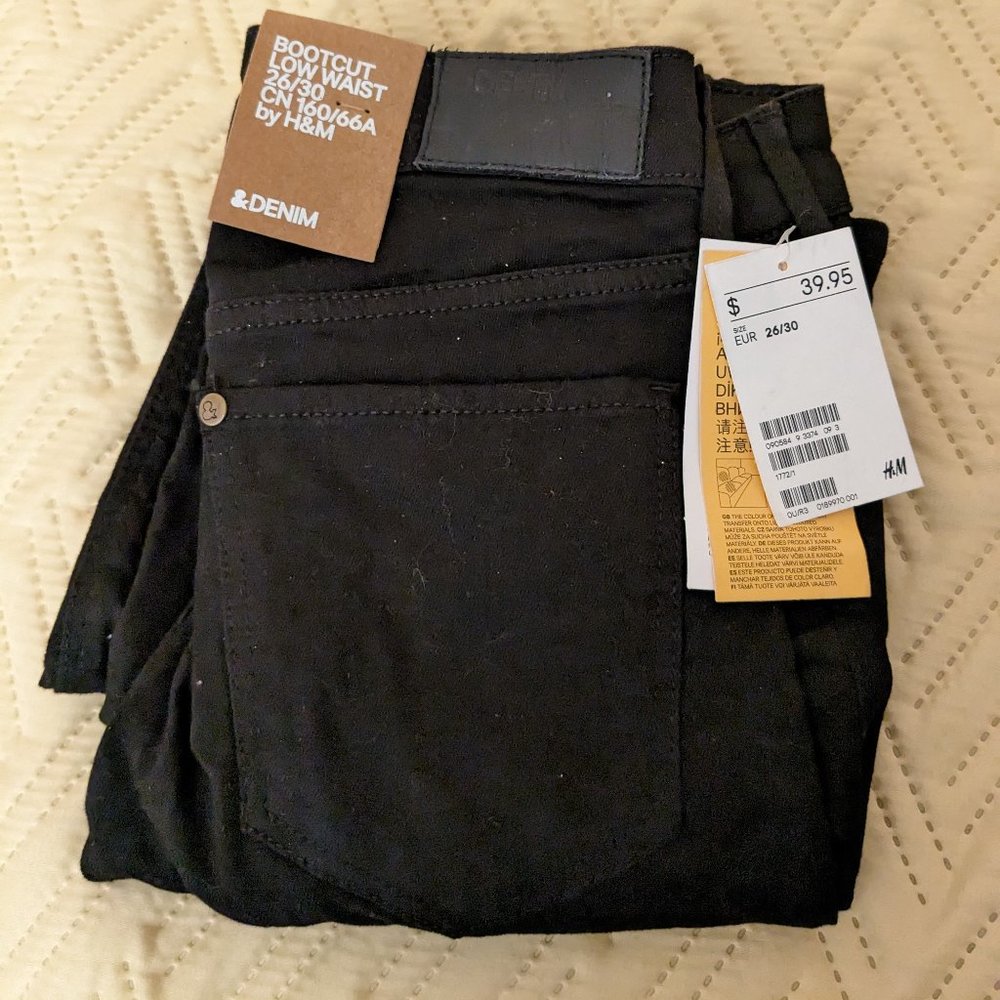 Black H&M low rise, boot cut jeans NWT